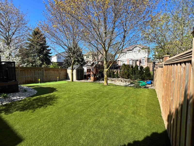 Backyard artificial turf installation